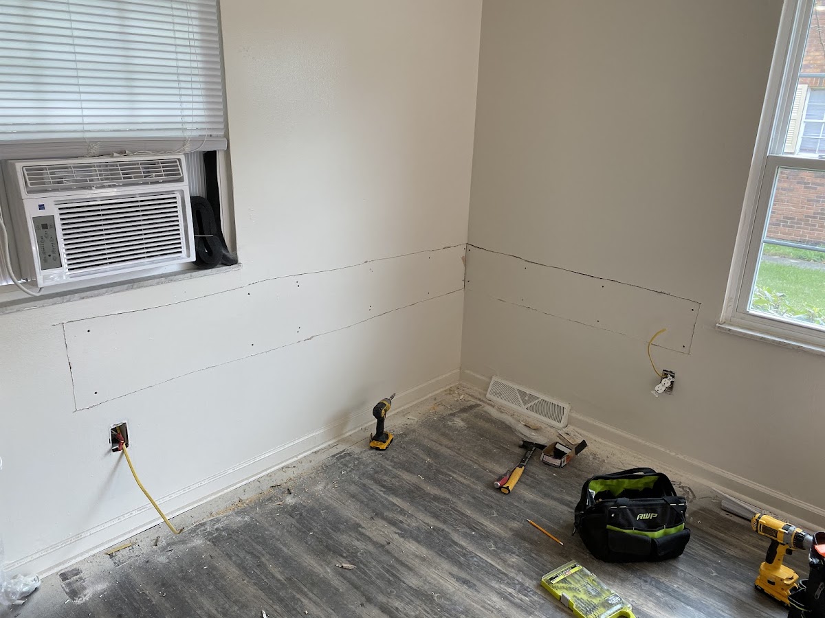 Drywall and electrical outlet repair in progress